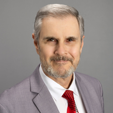 Fiduciary Fraser Allport offers a free Roth Guide explaining how a Roth IRA Conversion can reduce Income Taxes and IRMAA